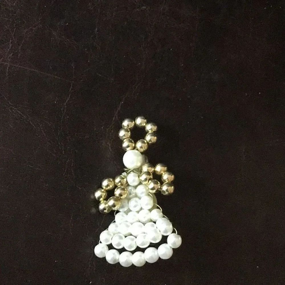 Beautiful little handmade bead angel brooch